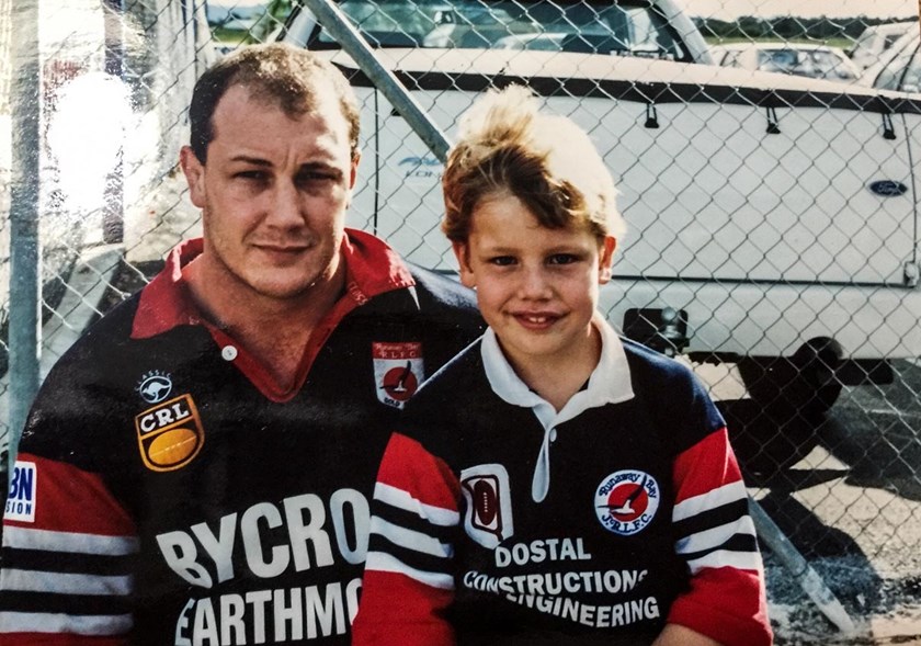 Jarrod Wallace as a junior footballer at Runaway Bay with his dad, Craig.