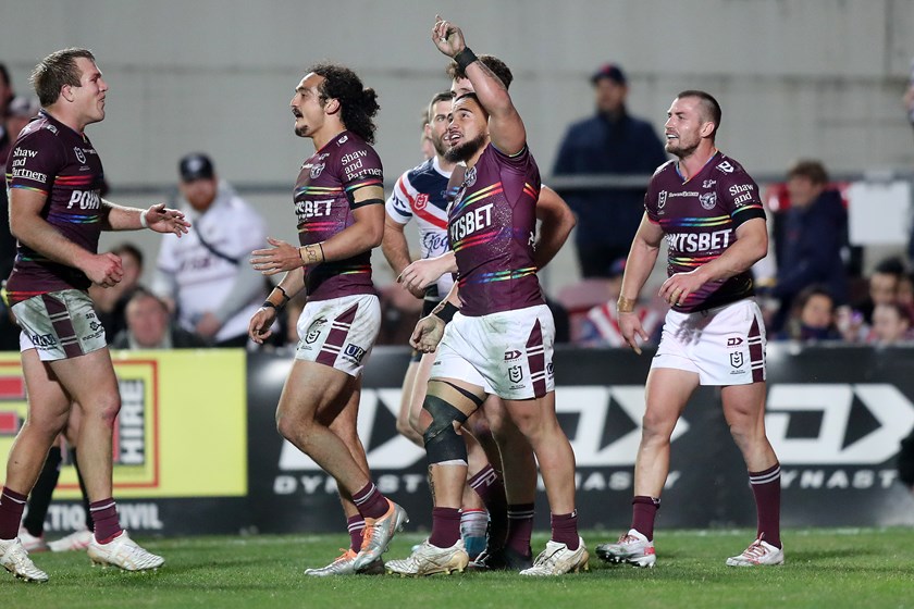 Alfred Smalley points to the sky after scoring a try on NRL debut on Thursday night.