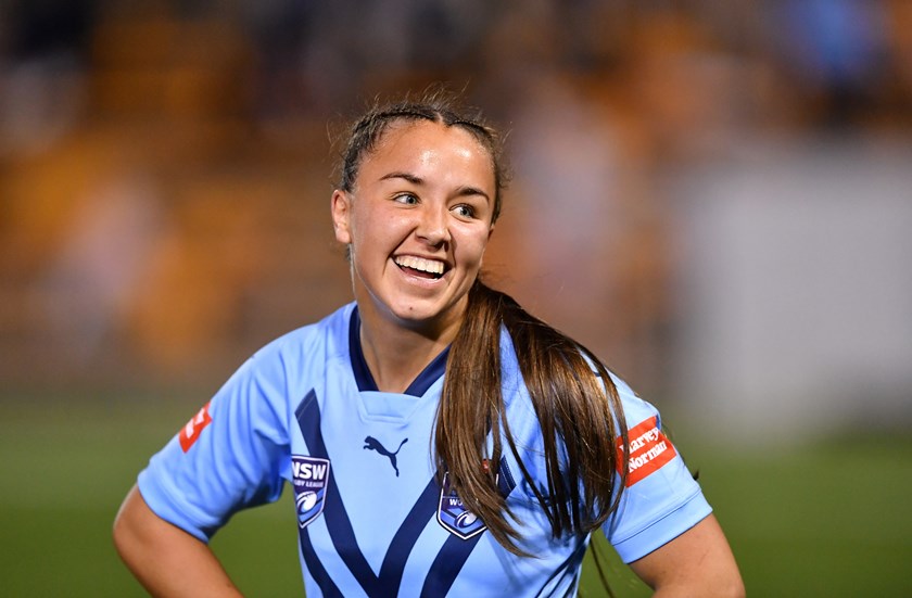 Jada Taylor celebrates after clocking 109 metres to score an Origin try to remember.