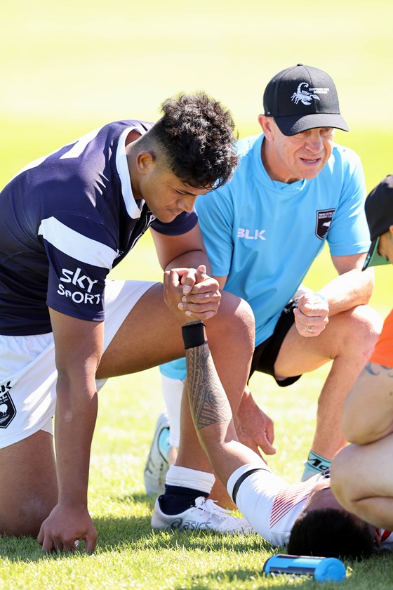 Ali Leiataua comforts Christian Pese after he suffered a stroke during a U-20 game. Credit: photosport.nz 