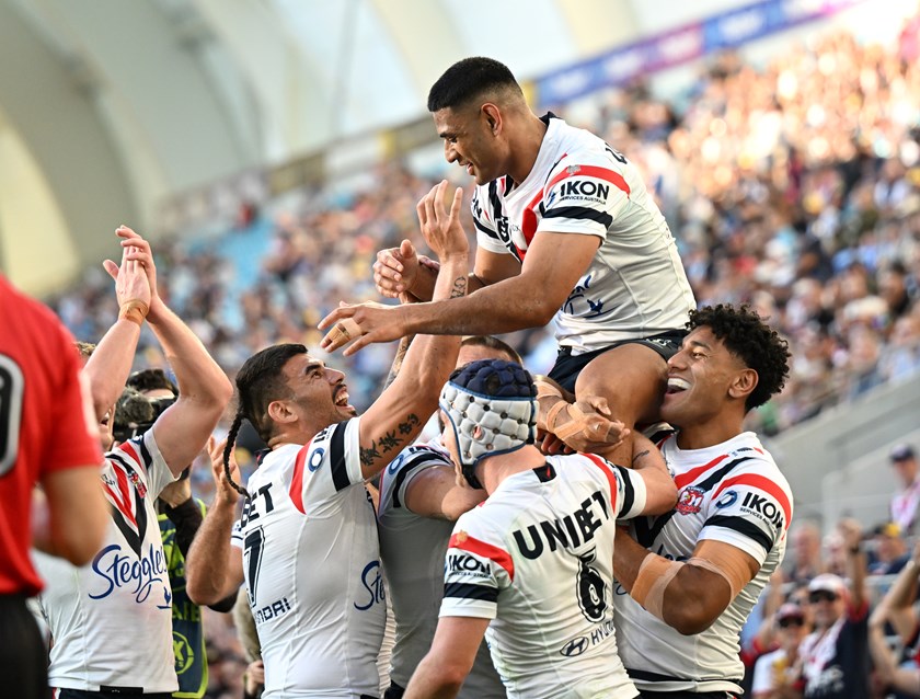 Roosters team-mates lifted Tupou on their shoulders after thinking he had broken the tryscoring record against the Titans