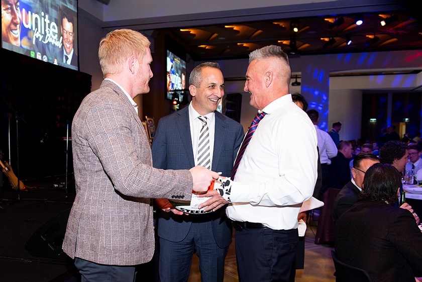 NRL CEO Andrew Abdo with Warriors owner Mark Robinson and St Helens legend James Graham.