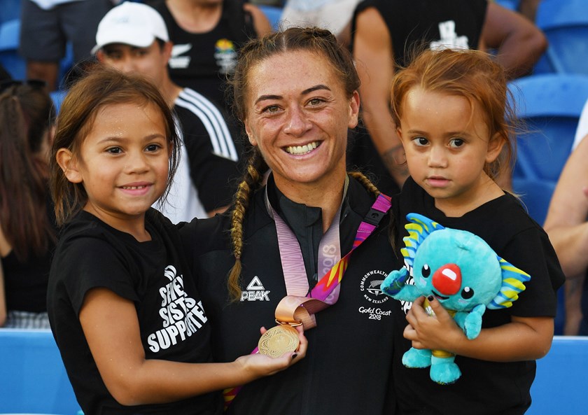 Niall Williams-Guthrie with daughters Tatum-Lee and Rema-Rae at the Gold Coast Commonwealth Games in 2018