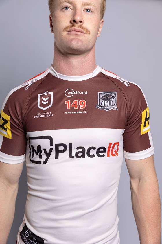 Tom Jenkins models the special jersey the Panthers will wear in Round 27.