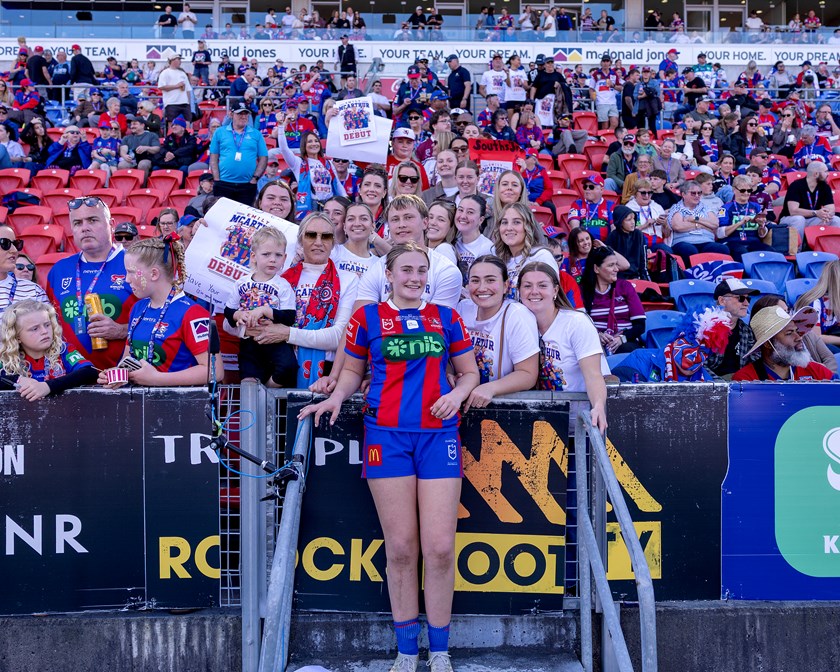 Emily McArthur shares a magic moment with family and friends after her NRLW debut.