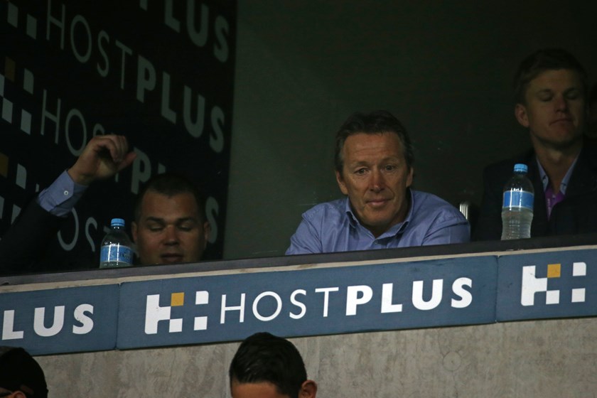 Anthony Seibold and Craig Bellamy in the Storm coach's box