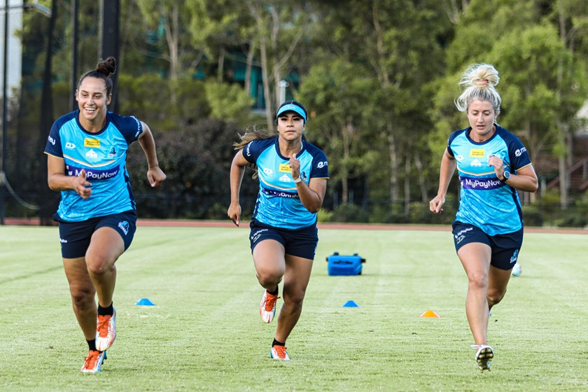 Tiana Raftstrand-Smith, Jasmine Peters and Grace Griffin at pre-season training this week.