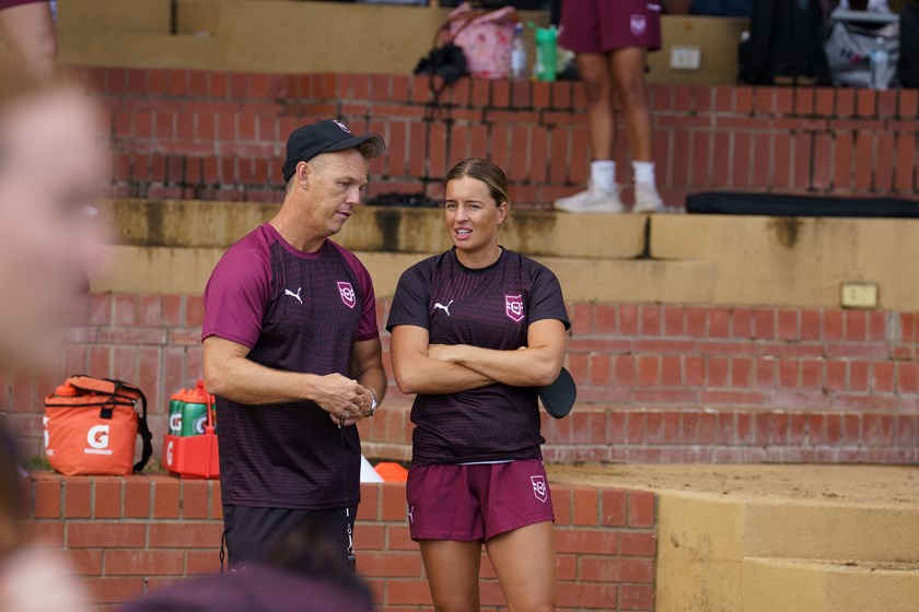 Lauren Brown and Queensland coach Nathan Cross talk tactics.