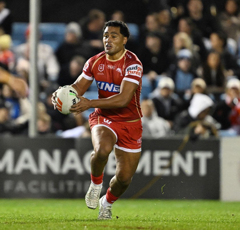 Max Feagai in action for the Dolphins.