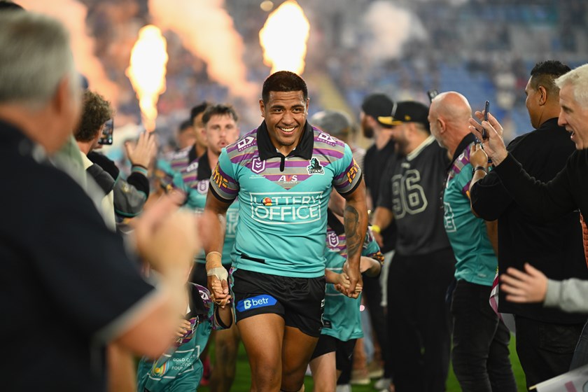 Moe Fotuaika leads out the Titans.