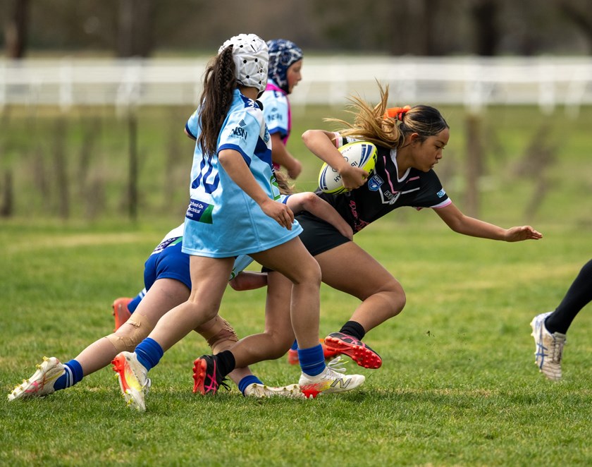 Chawisa Harper playing in a Tackle Under 14 game. 