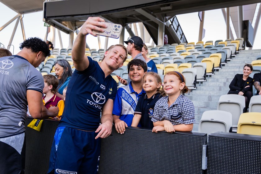 Jaxon Purdue with fans at the club's opening training session in the lead up to their finals match against the Sharks.
