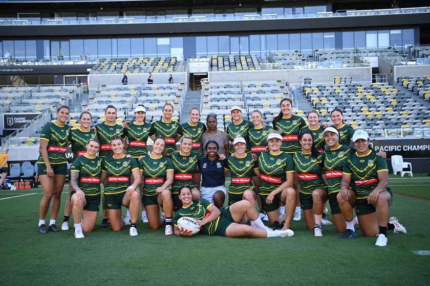 The Jillaroos with young fan Tahliyah Jawai and her mother Kaylene Jawai at the captain's run in Townsville. 