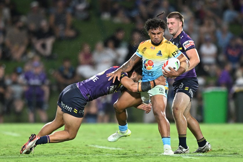 Siale Faeamani runs the ball against the Storm at Sunshine Coast Stadium.