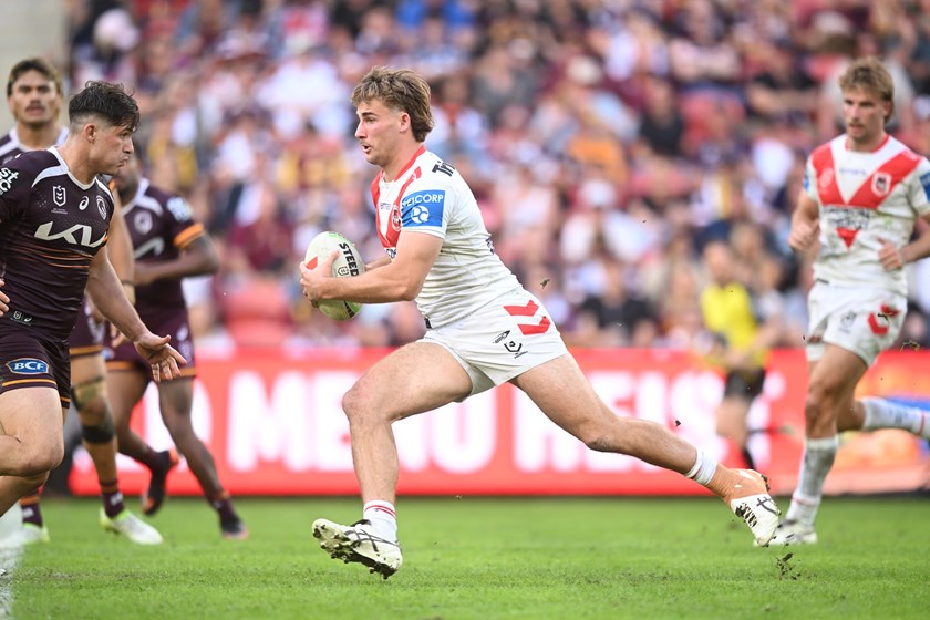 Toby Couchman charges into the Broncos defence.