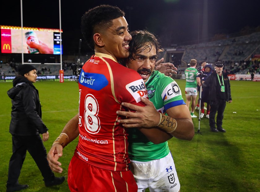 Brian Pouniu embraces with Daine Laurie after making his NRL debut in Canberra in Round 12.