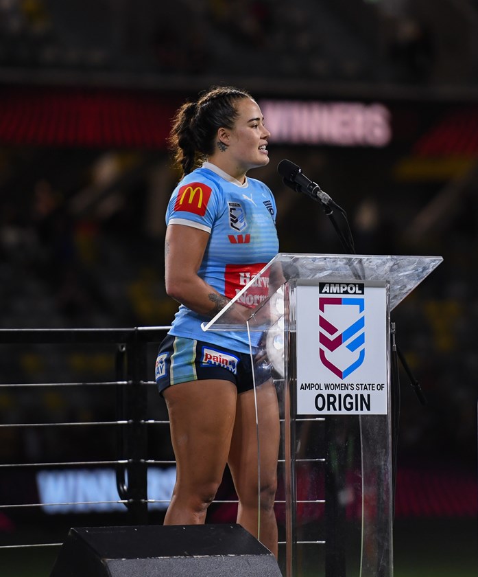 Sky Blues co-captain Isabelle Kelly addresses the crowd after the her side won Game Two of the women's Origin series.