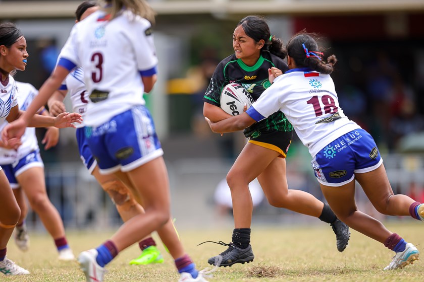 Cook Islands and Samoa girls face off.