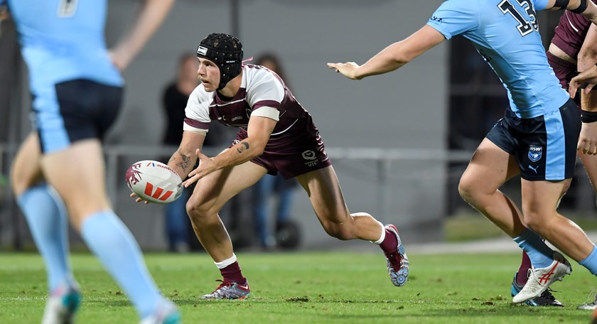 Queensland captain Blake Mozer with the ball in the Under 19 State of Origin match this year.
