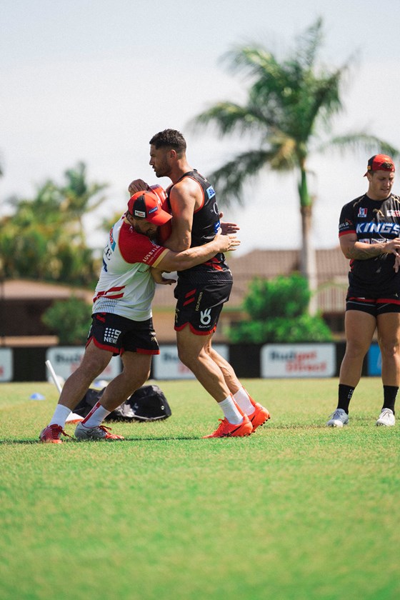 Kenny Bromwich and brother Jesse Bromwich take part in a tackling drill.
