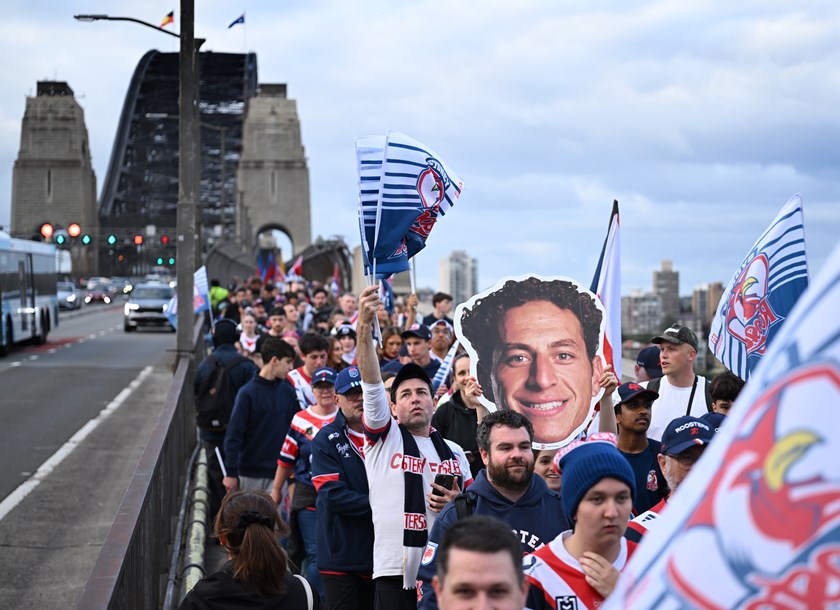Roosters and Knights fans took over the Sydney Harbour Bridge on Monday afternoon for a fan march to kick off Grand Final Week.