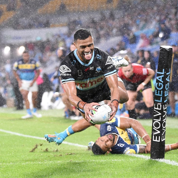 Sharks prove too strong for Titans in the wet