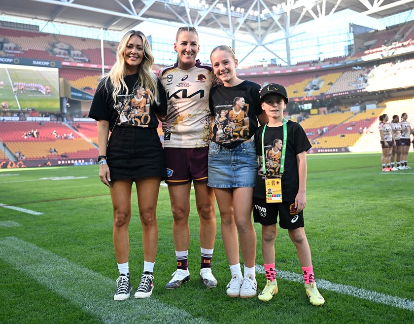 Ali Brigginshaw surrounded by her family in her 50 game milestone last season.