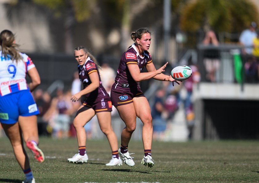 Lillian Yarrow runs the ball for the Broncos.