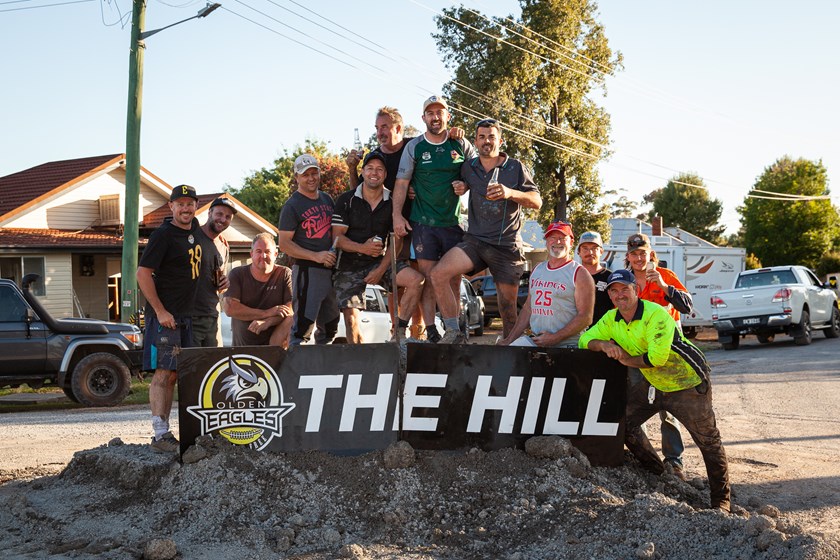 'The Hill' sign sat where spectators cheered on the Golden eagles at Ian Walsh Field was found in floodwaters and placed int the middle of the town. 