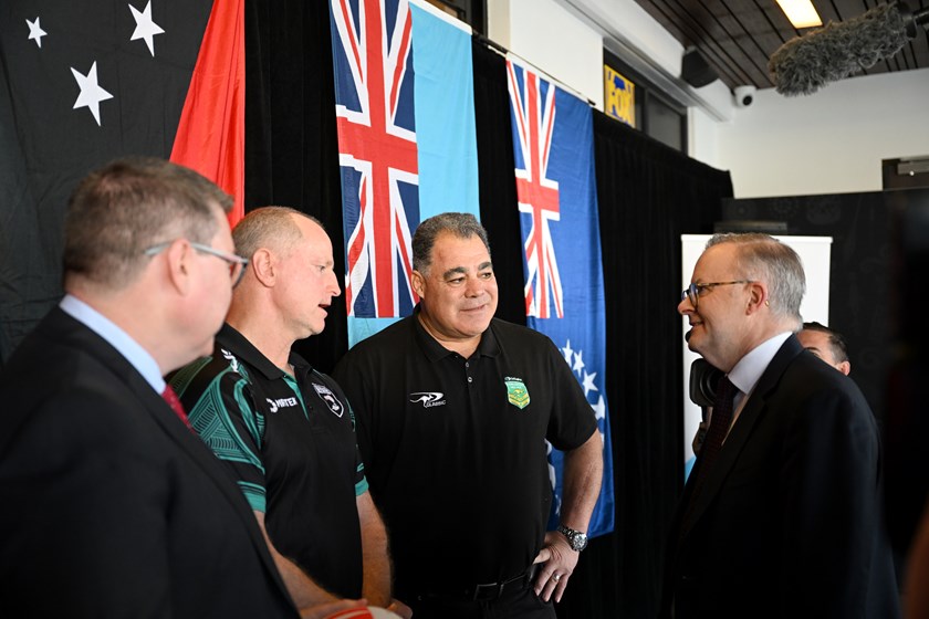 New Zealand men's coach Michael Maguire and Australian Kangaroos coach Mal Meninga with Australian Prime Minister Anthony Albanese. 