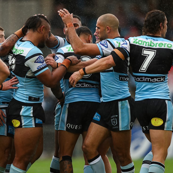 Sharks down Dragons to stay top of table