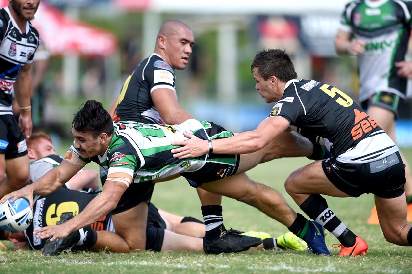 Brent Woolf, son of Ben Woolf, scores a try for Kristian Woolf's Townsville Blackhawks side. 