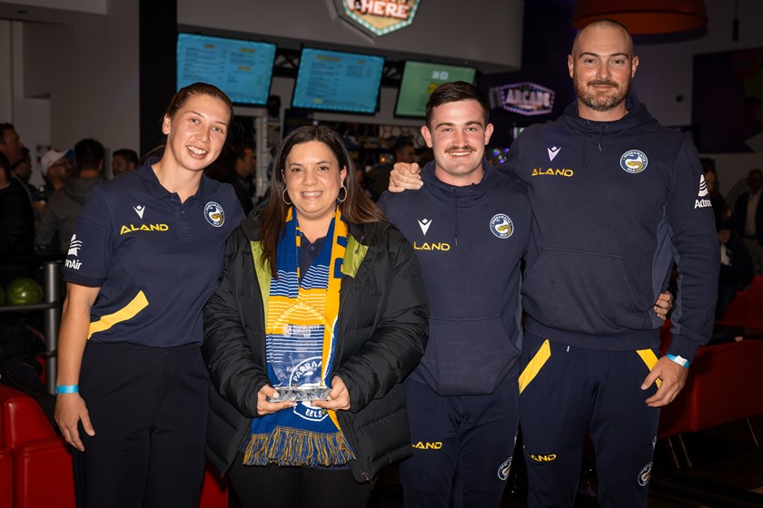 Kylie Boulous, receiving the NRL’s Teacher of the Year Award with local NRL Game Development Officers. Western Sydney, NSW