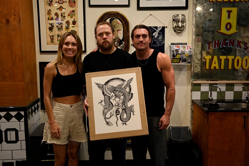 Marlee Silva, Tattoo Artist Gummy Johnston and Connor Watson with the 'In Pieces' artwork.
