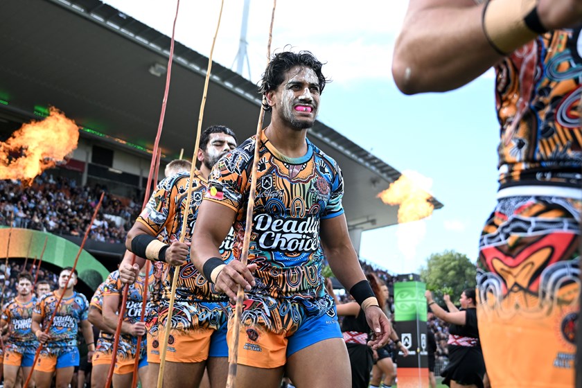 Alofiana Khan-Pereira walks out with the Indigenous All Stars team earlier this year in Hamilton.