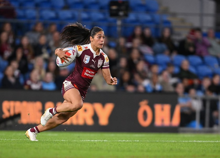 Destiny Mino-Sinapati with the ball for Queensland on debut.
