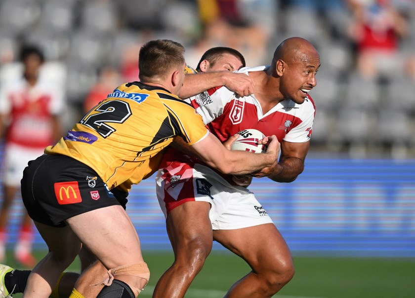 Felise Kaufusi takes the ball up for the Dolphins.