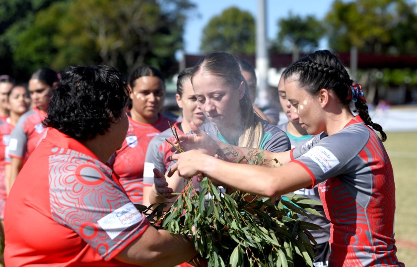 First Nations Gems representatives perform a smoking ceremony prior to their match against Ahi Ka Aotearoa.