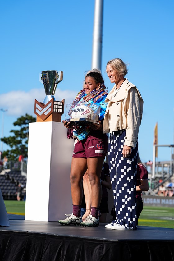 Sienna Laing accepts for player of the match award in the BMD Premiership grand final.