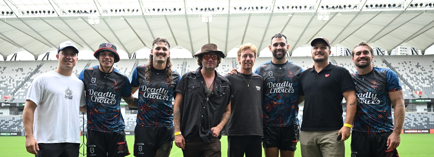 Six60 with members of the Men's Indigenous All Stars team.