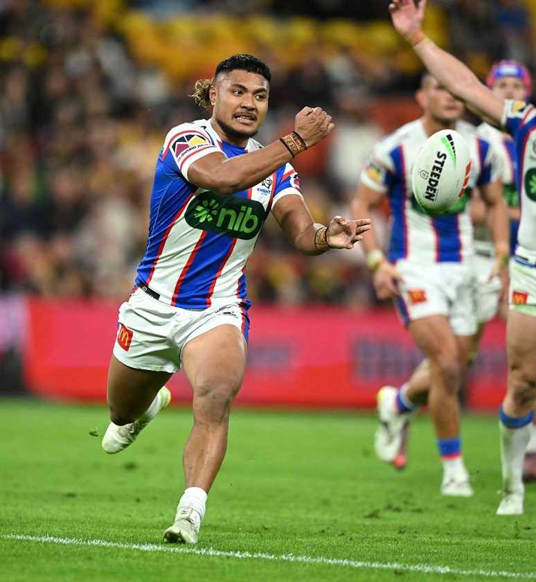 Francis Manuleleua passes the ball for Newcastle during the game against the Broncos.