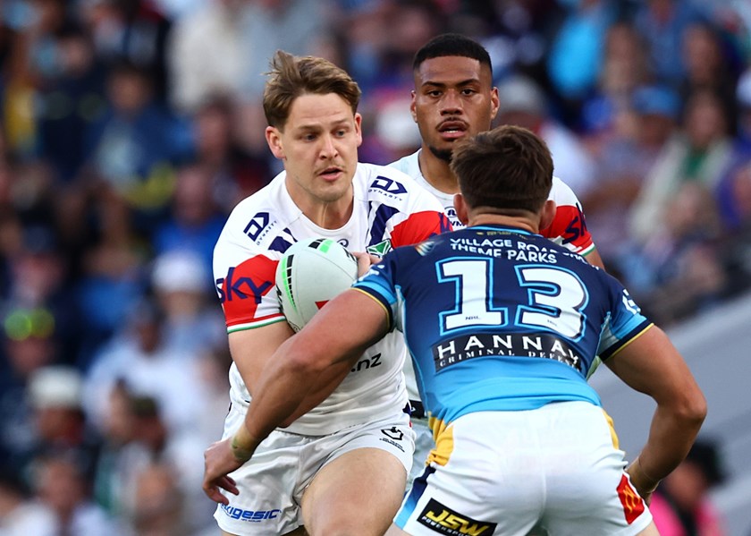 Riley Price runs the ball up for the Warriors in his club debut against the Titans.