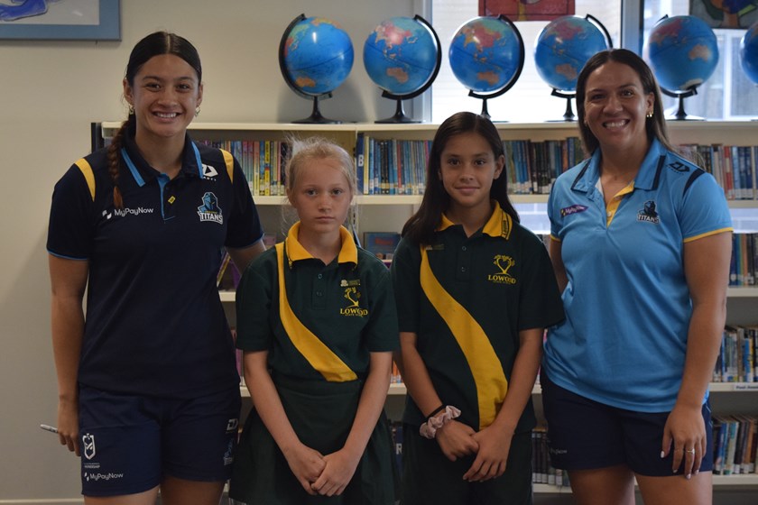 Gold Coast Titans players Hailee-Jay Ormond-Maunsell and Evania Pelite with Maddison and Zariah from Lowood State School. 