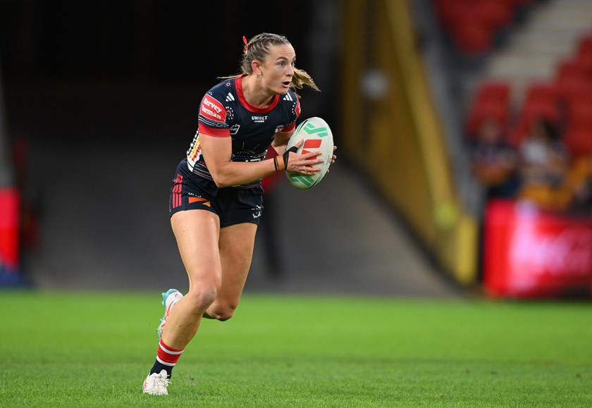 Brydie Parker runs the ball.