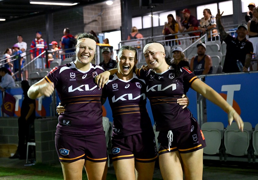 Chelsea Lenarduzzi, Julia Robinson and Romy Teitzel see the funny side after a physical clash against the Knights.