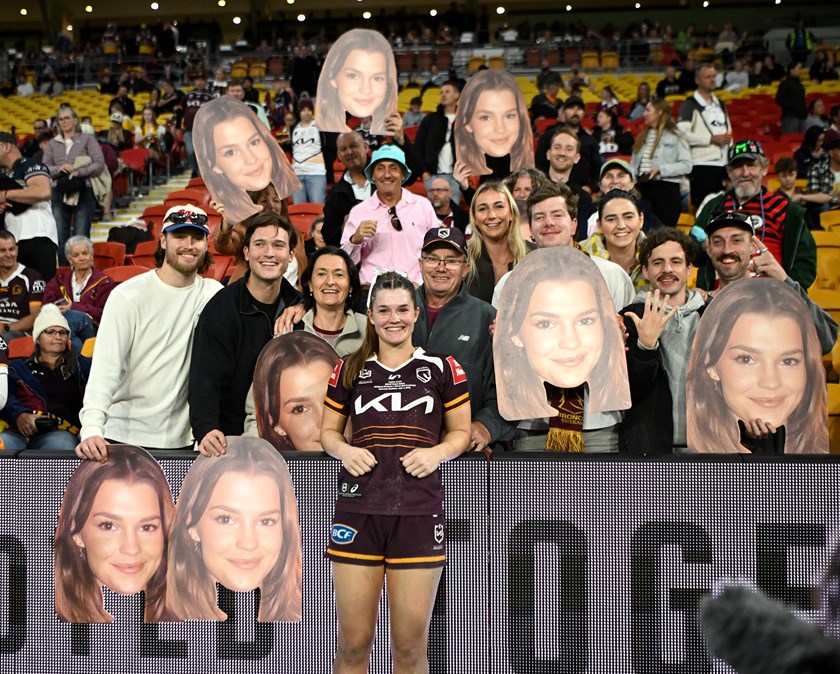 Caitlin Urwin with supporters after her NRLW debut.