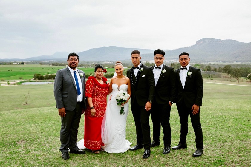 Chee Kam with his family on his wedding day.