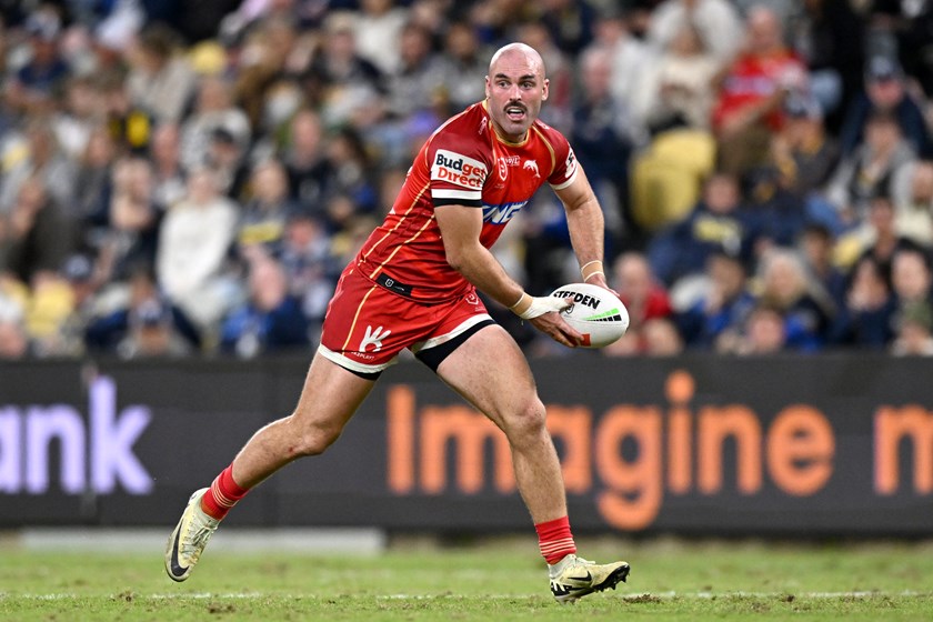 Mark Nicholls with the ball for the Dolphins.