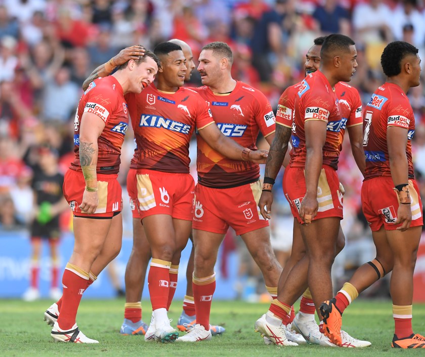 Jamayne Isaako celebrates with his Dolphins teammates. 