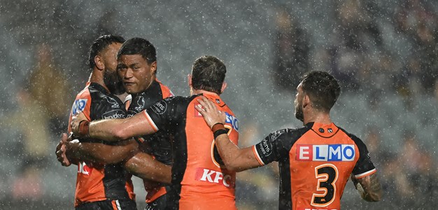 Wests Tigers down Roosters in  the wet